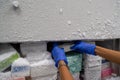 The researcher opens the storage box that keeps the sample in -80C refrigerator. To finds samples of protein used for the further