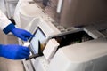 Researcher is using immunoassay analyzer in laboratory Royalty Free Stock Photo