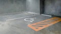 Reserve parking lot for disabled at modern building basement, international symbol or universal sign for handicapped parking Royalty Free Stock Photo