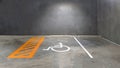 Reserve parking lot for disabled at modern building basement, international symbol or universal sign for handicapped parking Royalty Free Stock Photo