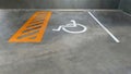 Reserve parking lot for disabled at modern building basement, international symbol or universal sign for handicapped parking Royalty Free Stock Photo