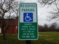 reserved parking disabled sign unlawful fine warning