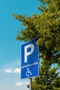 Reserved parking space sign, handicapped person with disability in wheelchair pictogram Royalty Free Stock Photo