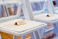 Reserved Sign on Chairs at Wedding