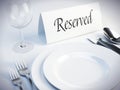 Reserved sign on a restaurant table Royalty Free Stock Photo