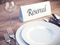 Reserved sign on a restaurant table Royalty Free Stock Photo