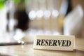 Reserved sign on restaurant table Royalty Free Stock Photo