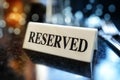 Reserved sign on restaurant table