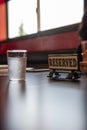 Reserved sign on a wooden table in a local Japanese restaurant. Royalty Free Stock Photo