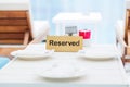 Reserved table in the lounge area by the pool Royalty Free Stock Photo