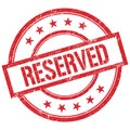 RESERVED text written on red vintage stamp Royalty Free Stock Photo