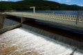 Reservoir Dam Spillway with Water Pouring over the Top in the Mo Royalty Free Stock Photo