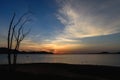 Reservoir with surrounding mountains and beautiful skies in Thailand