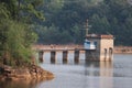 Reservoir, there are several people on the bridge