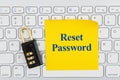 Reset password with lock on a keyboard with a sticky note