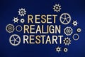 Reset Realign Restart alphabet letters with gears element on navy blue background Royalty Free Stock Photo