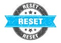 reset round stamp with ribbon. label sign Royalty Free Stock Photo