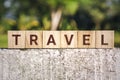 Travel Word on Wooden Block