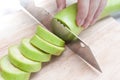 Resh green eggplant sliced on wooden board Royalty Free Stock Photo