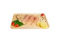 Resh raw chicken tenders, lemon, spices on wooden cutting board Royalty Free Stock Photo