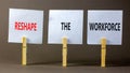 Reshape the workforce and support symbol. Concept words Reshape the workforce on white paper on clothespins. Beautiful grey Royalty Free Stock Photo