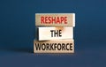 Reshape the workforce and support symbol. Concept words Reshape the workforce on wooden blocks. Beautiful grey table grey Royalty Free Stock Photo