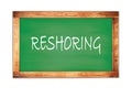 RESHORING text written on green school board