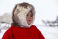 A resident of the tundra, indigenous residents of the Far North, open area, Little girl in red clothes,Nenets-Malitsa clothing