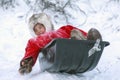 A resident of the tundra, indigenous residents of the Far North, tundra, open area, children ride on sledges, children in