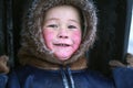 A resident of the tundra, indigenous residents of the Far North, tundra, open area, children ride on sledges, children in