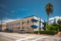 Residential apartment building in Miami Beach Florida with blue awnings Royalty Free Stock Photo