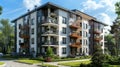 Residential apartment building with a white facade, glass balconies and green lawns in front of the house Royalty Free Stock Photo