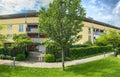 Residential area with ecological and sustainable green residential buildings, low-energy houses with apartments and green