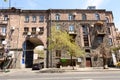 Residential building in center of Yerevan, built of traditional pink tuff - volcanic rock