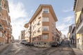 A residential building on a corner with Royalty Free Stock Photo