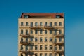 Residential building facade, house isolated on blue sky Royalty Free Stock Photo