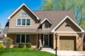 residential building suburban house architecture in neighborhood of america with garage Royalty Free Stock Photo