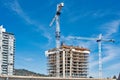 Residential building under constraction on blue sky background Royalty Free Stock Photo