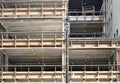 Residential building under construction with construction scaffolds Royalty Free Stock Photo
