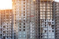 Residential building under construction, a view near the walls and windows floors Royalty Free Stock Photo