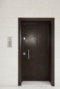Residential Building Wall With Iron Door And Intercom System