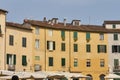 Residential buildings on oval Amphitheater Square in Lucca, Ital Royalty Free Stock Photo