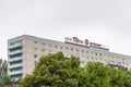 Residential buildings from soviet era in East Berlin a cloudy day of summer. LKW Tatra Motokov sign