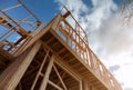 Residential construction home framing on new house wooden under construction material in wooden frame Royalty Free Stock Photo