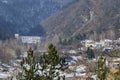 Residential district of bulgarian houses in winter village Pasarel with Hydro-Electric power station