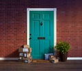 Residential front door with stacks of boxes from online purchases