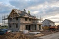 Residential house construction in progress at building site Royalty Free Stock Photo