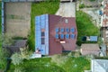 Residential house with rooftop covered with solar photovoltaic panels for producing of clean ecological electrical