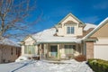 Residential house on winter sunny day decorated for Christmas celebration Royalty Free Stock Photo