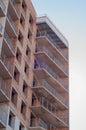 A residential multi-storey building under construction, a fragment of a house. Brick walls, monolithic concrete slabs Royalty Free Stock Photo